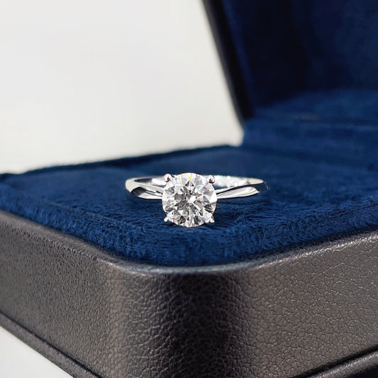 Four-Prong Petite Solitaire Ring — Delicate Modern Radiance